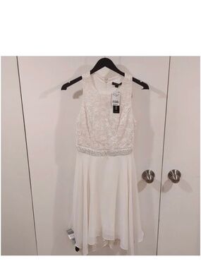 NWT Le Chateau mini dress size small